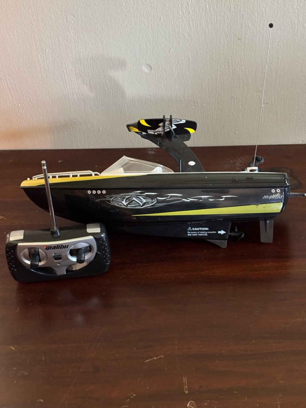 Malibu Black and Yellow Remote Control Boat with Transmitter.